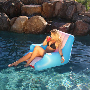 a woman sitting on a blue inflatable