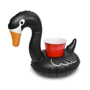 a black duck shaped inflatable with a red cup