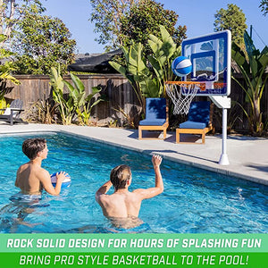a man and woman playing basketball in a pool