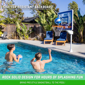 a man and woman playing basketball in a pool