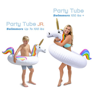 a woman and a child are holding inflatables